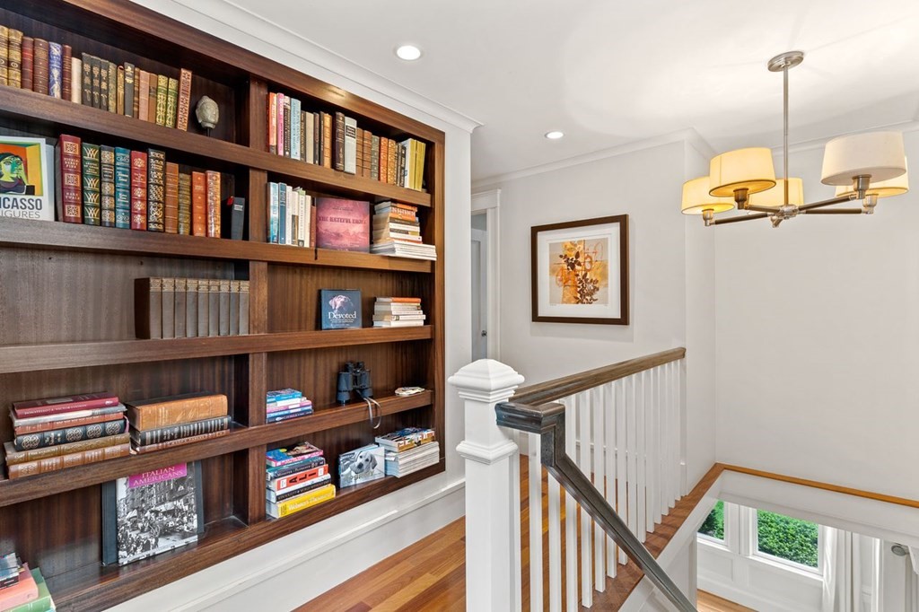 22 Robert Road Marblehead, MA 01945 - Photo 21 of 41 a view of a book shelf with lots of books