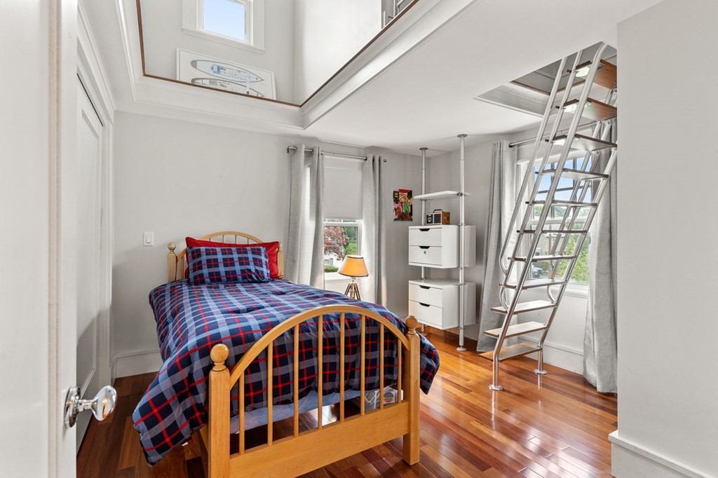 22 Robert Road Marblehead, MA 01945 - Photo 22 of 41 a bedroom with furniture and a window