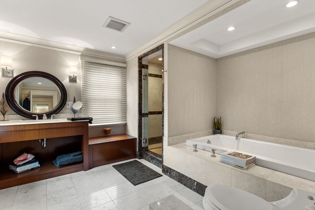 22 Robert Road Marblehead, MA 01945 - Photo 26 of 41 a bathroom with a sink a vanity and a mirror