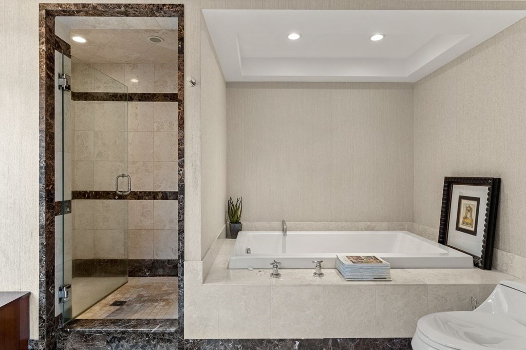 22 Robert Road Marblehead, MA 01945 - Photo 27 of 41 a bathroom with a bathtub and a shower