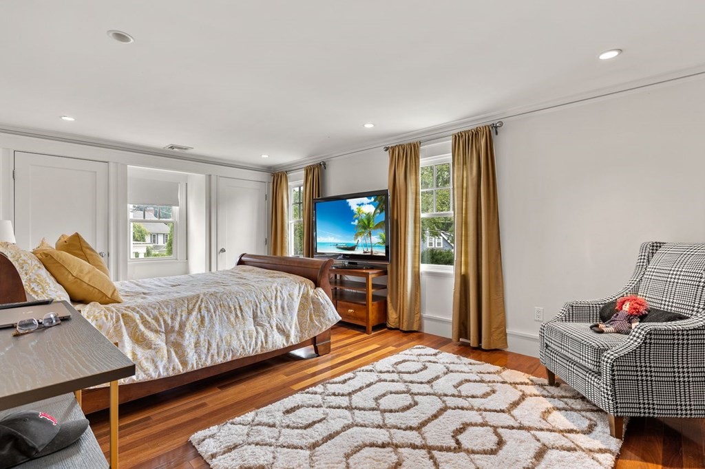 22 Robert Road Marblehead, MA 01945 - Photo 28 of 41 a bedroom with bed and wooden floor