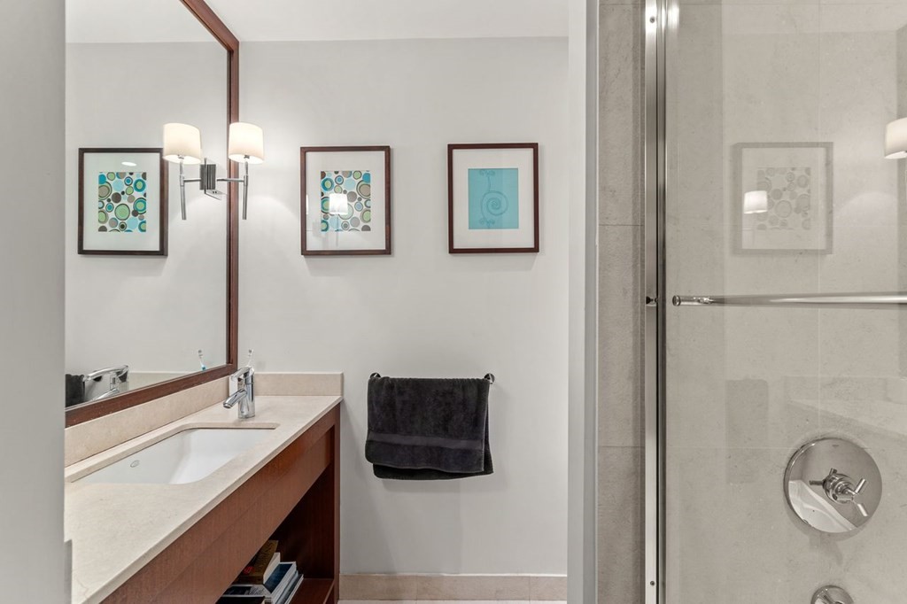 22 Robert Road Marblehead, MA 01945 - Photo 30 of 41 a bathroom with a sink and a mirror