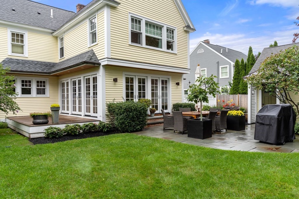 22 Robert Road Marblehead, MA 01945 - Photo 36 of 41 a view of a house with backyard sitting area and garden