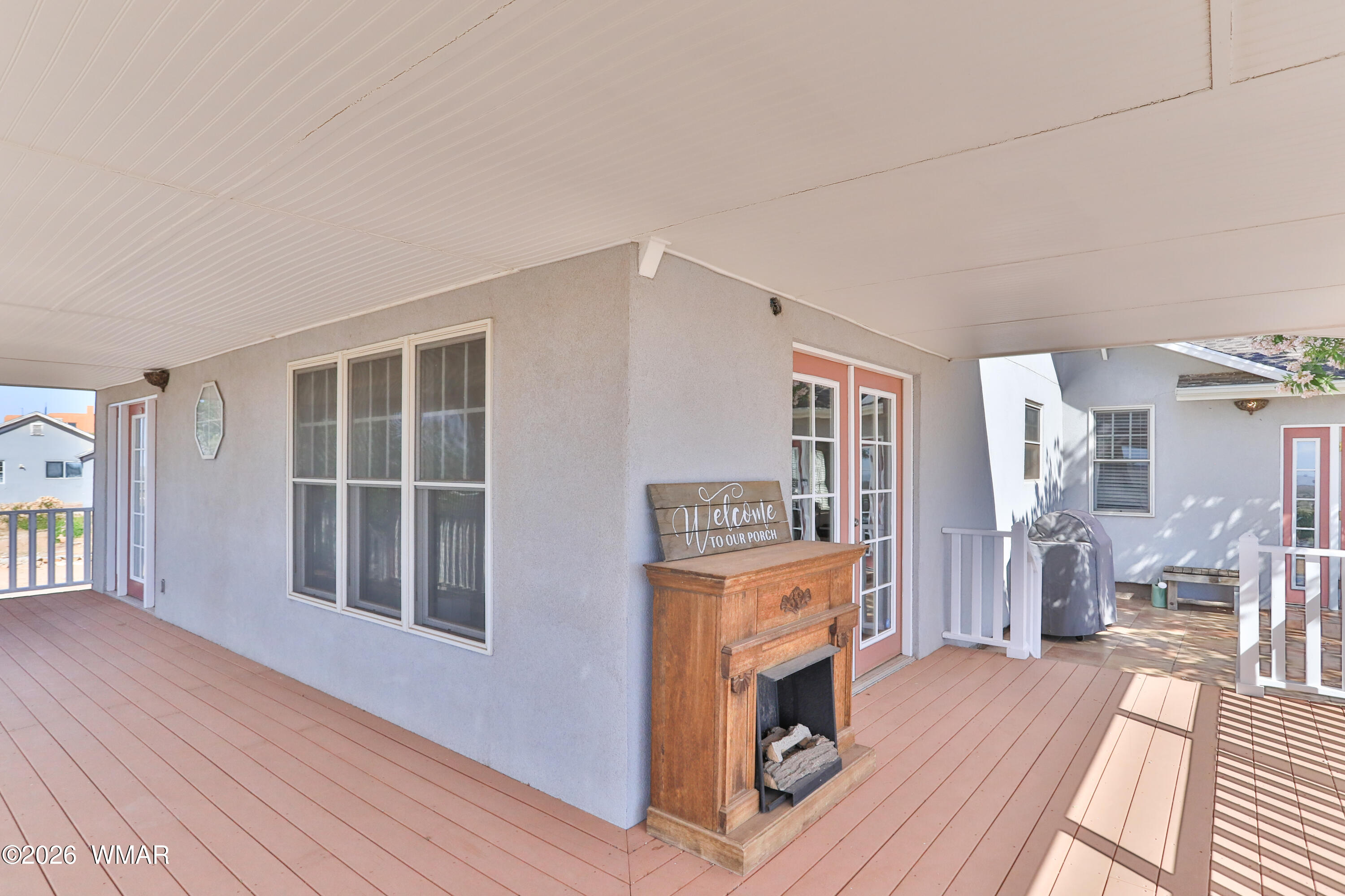 102 Crestview Road Holbrook, AZ 86025 - Photo 41 of 55 a room with furniture and a wooden floor