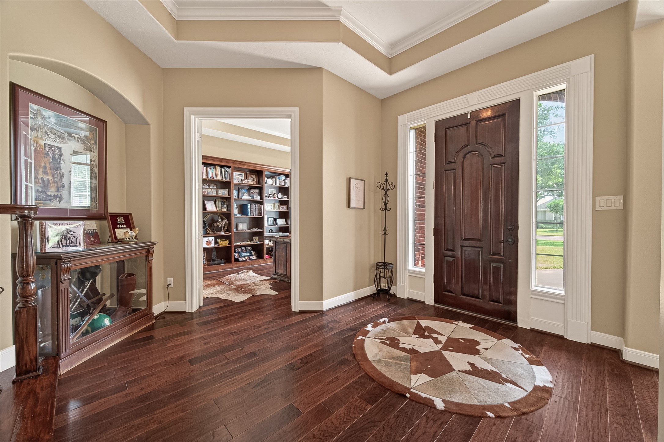 2319 Braer Ridge Drive Katy, TX 77494 - Photo 6 of 50 a view of a livingroom with wooden floor and a fireplace