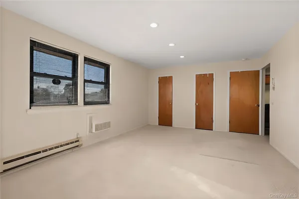 an empty room with windows