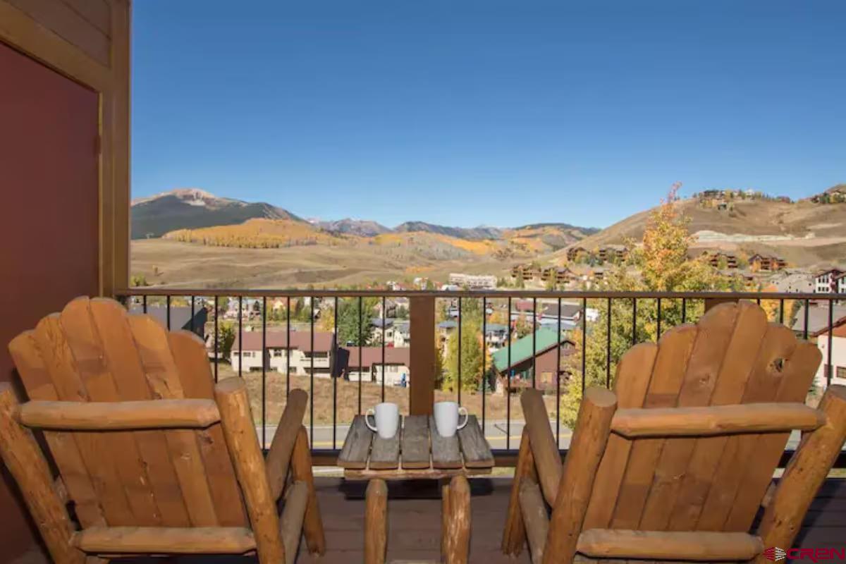 20 Hunter Hill Road, Unit 202 Crested Butte, CO 81225 - Photo 19 of 25 a view of a balcony with lake view and mountain view