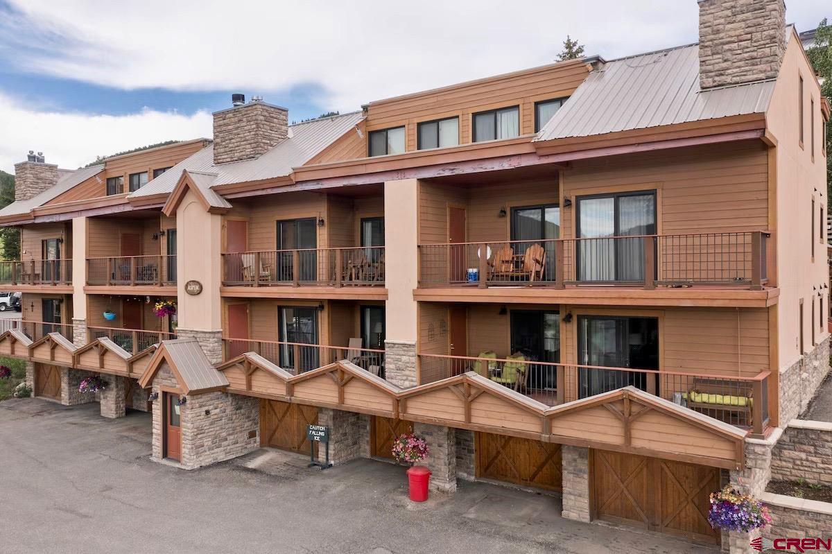 20 Hunter Hill Road, Unit 202 Crested Butte, CO 81225 - Photo 5 of 25 a view of a car park in front of a building