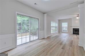 3686 Claredun Court Cumming, GA 30040 - Photo 13 of 29 an empty room with wooden floor and windows