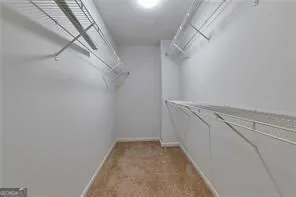 a view of a room with racks on the wall