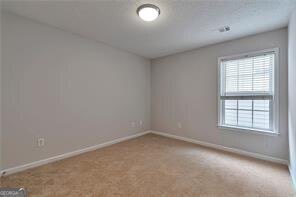 3686 Claredun Court Cumming, GA 30040 - Photo 21 of 29 an empty room with a window