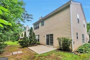 3686 Claredun Court Cumming, GA 30040 - Photo 25 of 29 a view of a house with backyard and sitting area