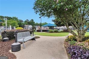 3686 Claredun Court Cumming, GA 30040 - Photo 26 of 29 a view of a garden with plants and large trees