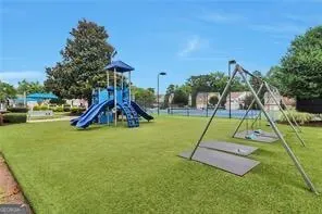 a view of a park with a slide
