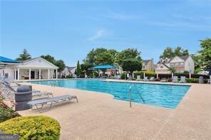 3686 Claredun Court Cumming, GA 30040 - Photo 28 of 29 a front view of a house with garden