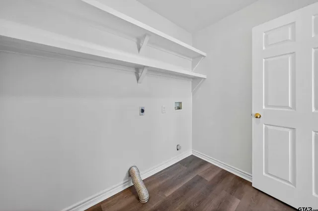 a view of a room with rack on the wall