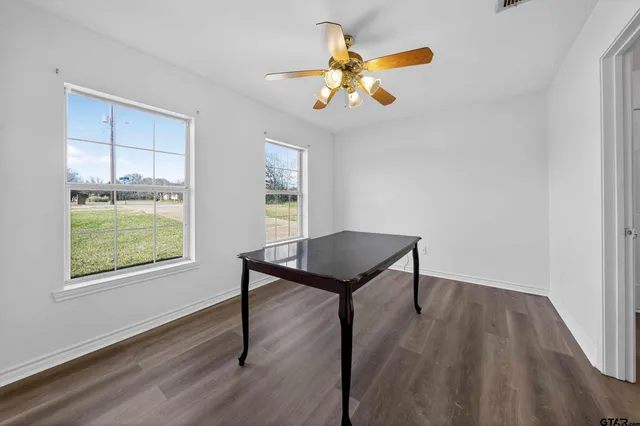 a view of a livingroom with furniture and window