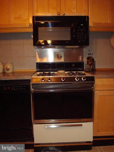 1919 Tyler Road Dundalk, MD 21222 - Photo 27 of 30 Gas Stove and Microwave