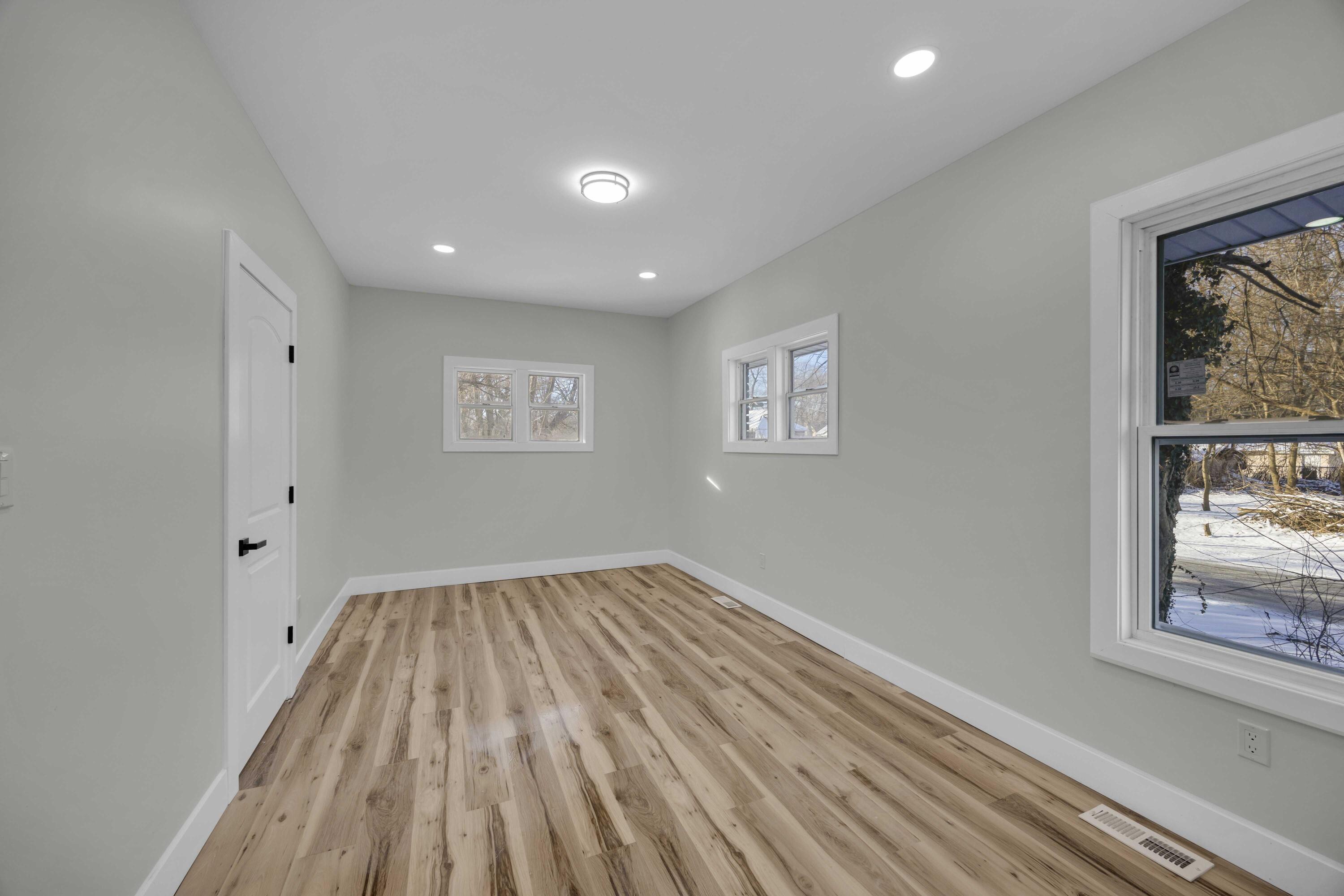 4200 Monroe Street Gary, IN 46408 - Photo 13 of 25 a view of room with window and wooden floor