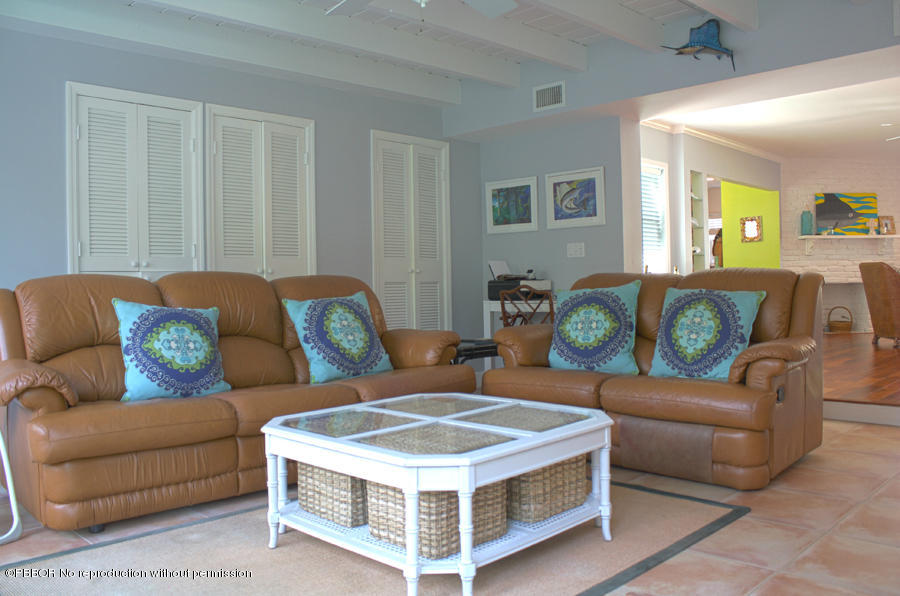 216 Costello Road West Palm Beach, FL 33405 - Photo 11 of 25 a living room with furniture and a couch