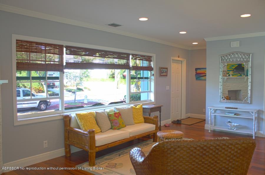 216 Costello Road West Palm Beach, FL 33405 - Photo 19 of 25 a living room with furniture and a large window