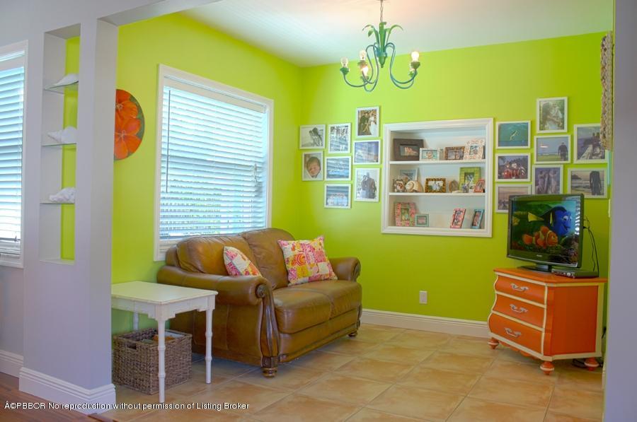216 Costello Road West Palm Beach, FL 33405 - Photo 20 of 25 a living room with furniture and a window