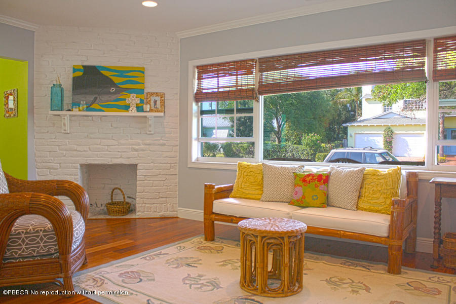216 Costello Road West Palm Beach, FL 33405 - Photo 3 of 25 a living room with furniture and a large window