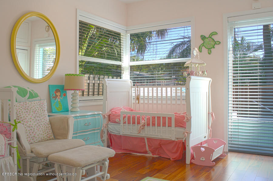 216 Costello Road West Palm Beach, FL 33405 - Photo 7 of 25 a living room with furniture and a window