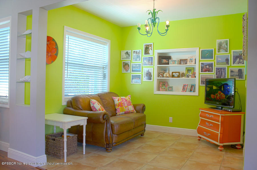 216 Costello Road West Palm Beach, FL 33405 - Photo 9 of 25 a living room with furniture and a window