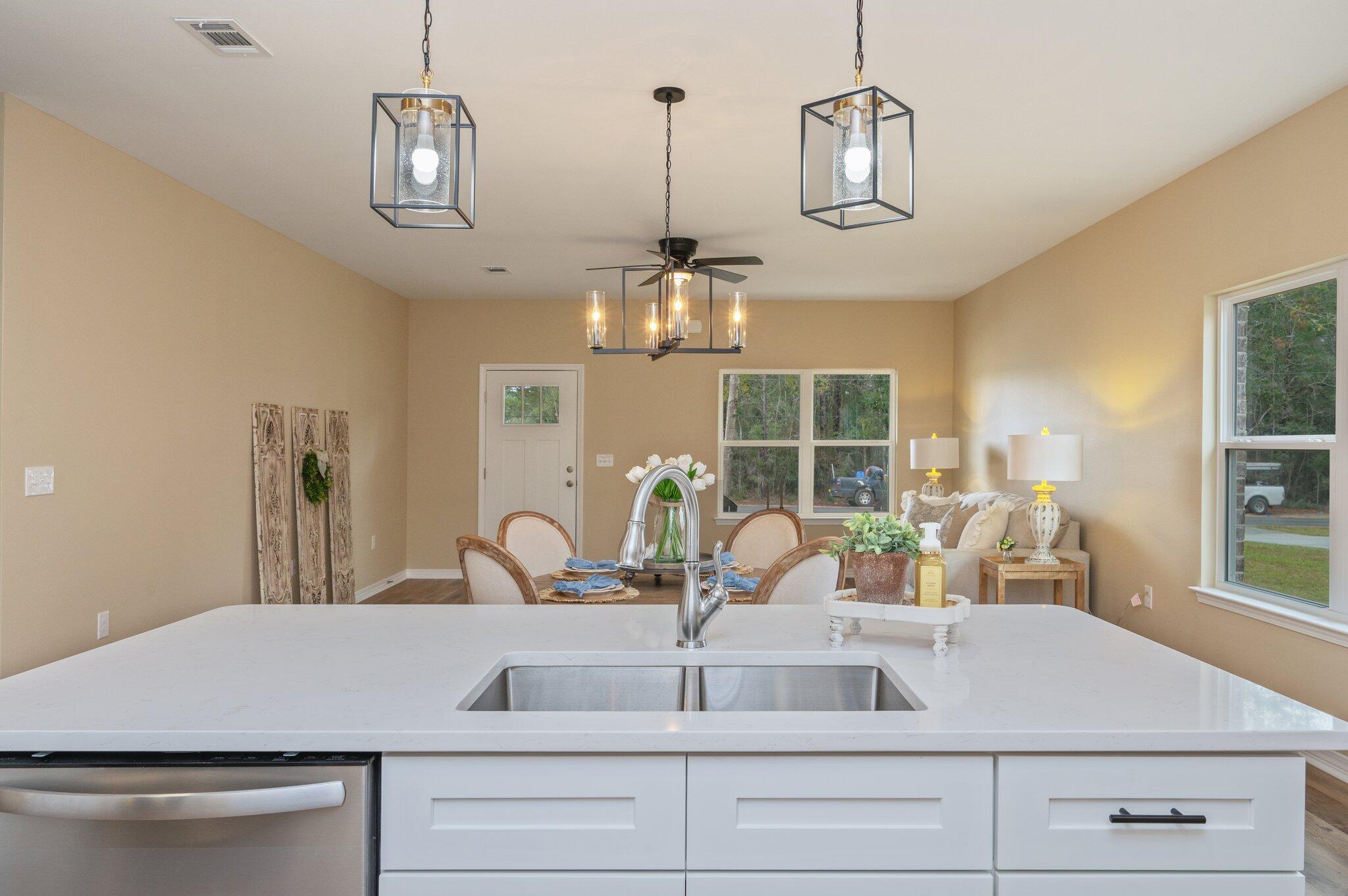 6031 Sand Hill Road Crestview, FL 32539 - Photo 11 of 11 a kitchen with sink and window