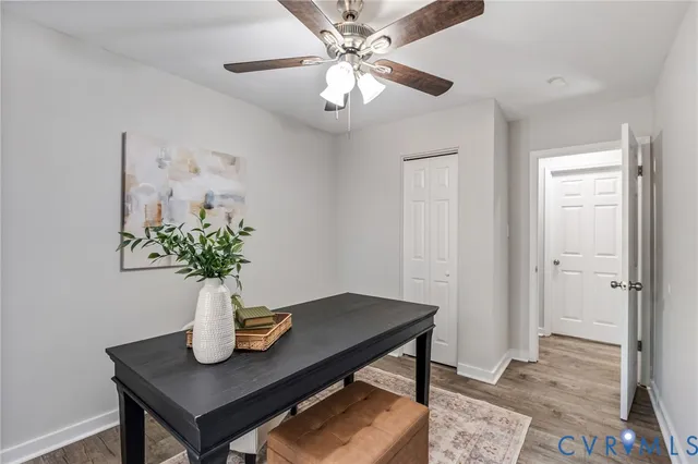 a view of kitchen with furniture and wooden floor