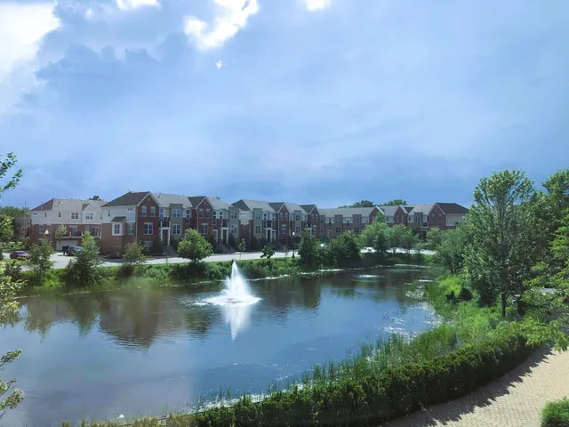 a view of a lake with a city