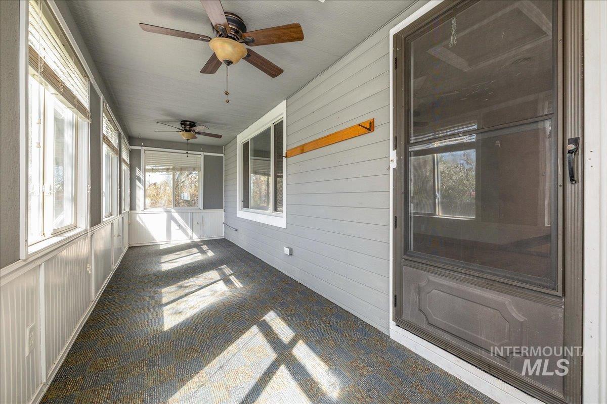 3002 Frozen Dog Road Emmett, ID 83617 - Photo 12 of 50 Unfurnished sunroom featuring ceiling fan