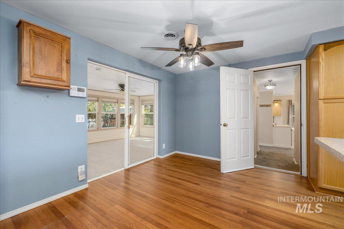 3002 Frozen Dog Road Emmett, ID 83617 - Photo 20 of 50 Unfurnished bedroom with light wood-type flooring and a ceiling fan