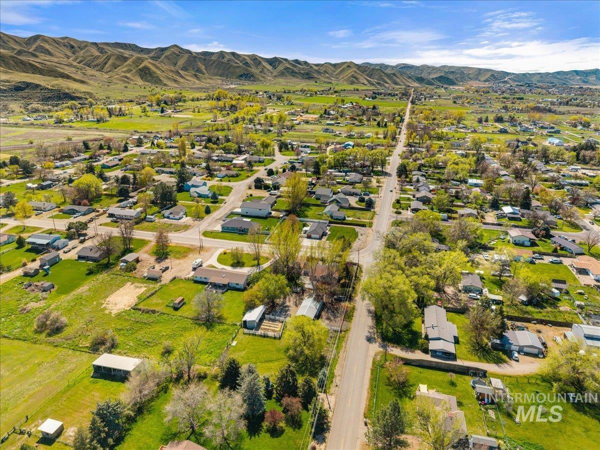 3002 Frozen Dog Road Emmett, ID 83617 - Photo 3 of 50 Aerial view of residential area with a mountain backdrop