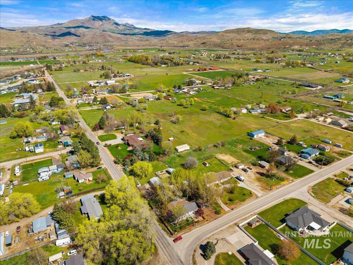 3002 Frozen Dog Road Emmett, ID 83617 - Photo 49 of 50 Aerial perspective of suburban area featuring a mountainous background