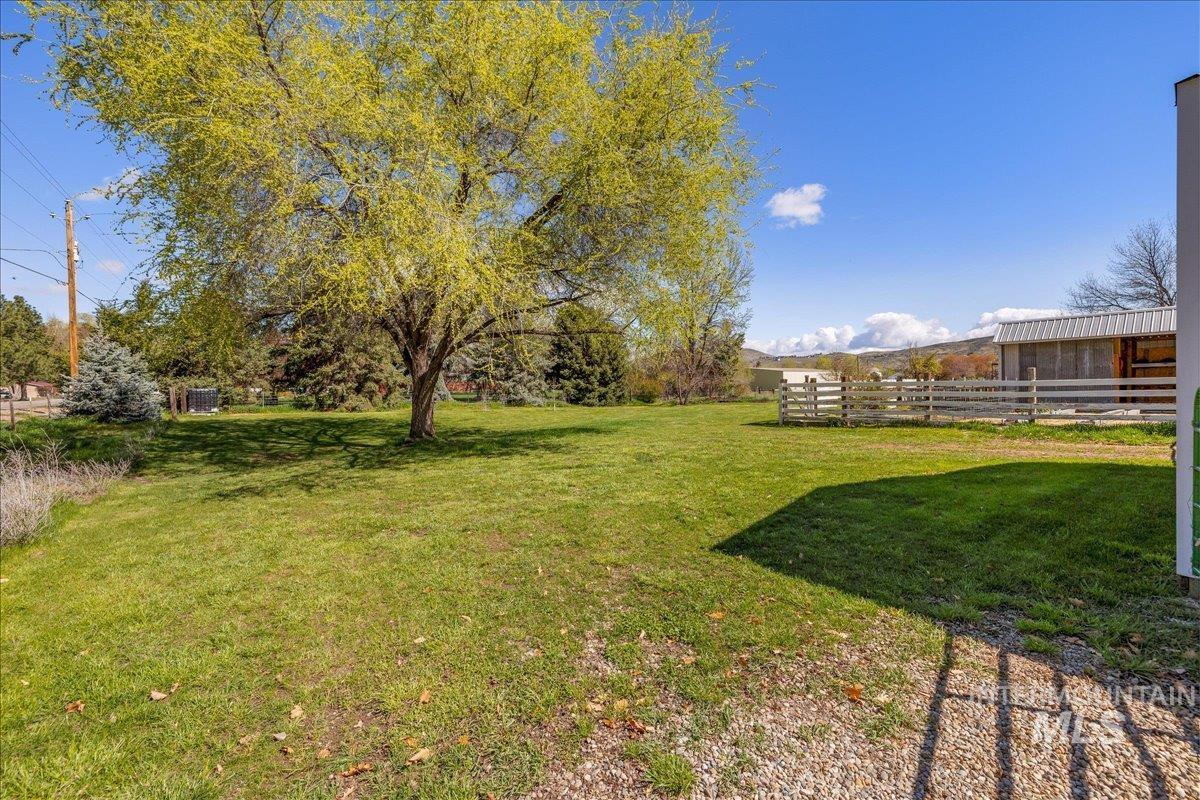 3002 Frozen Dog Road Emmett, ID 83617 - Photo 10 of 50 View of green lawn featuring an outbuilding
