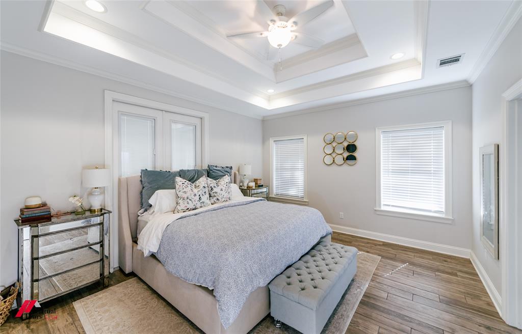 327 Ramsey Road Stonewall, LA 71078 - Photo 23 of 40 a bedroom with a bed and a window