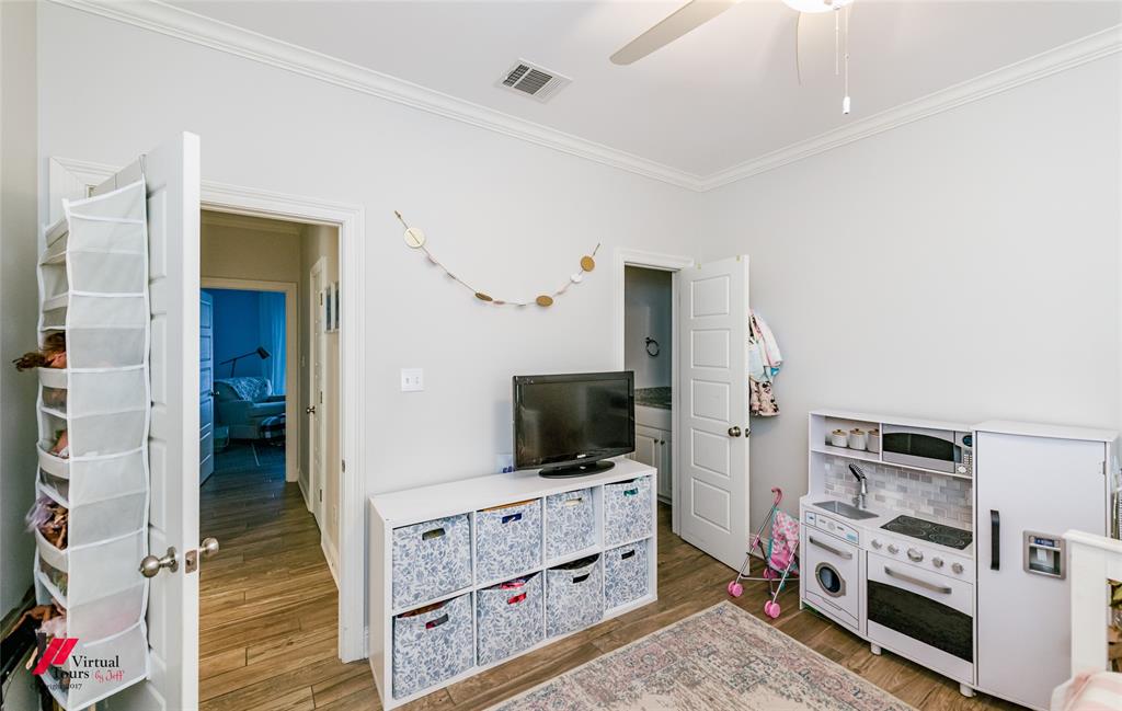 327 Ramsey Road Stonewall, LA 71078 - Photo 28 of 40 a room with furniture and flat screen tv