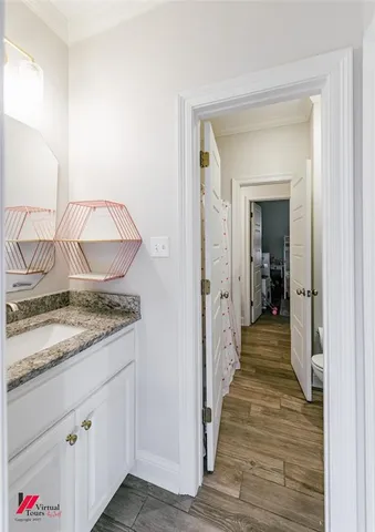 a view of a kitchen from the hallway
