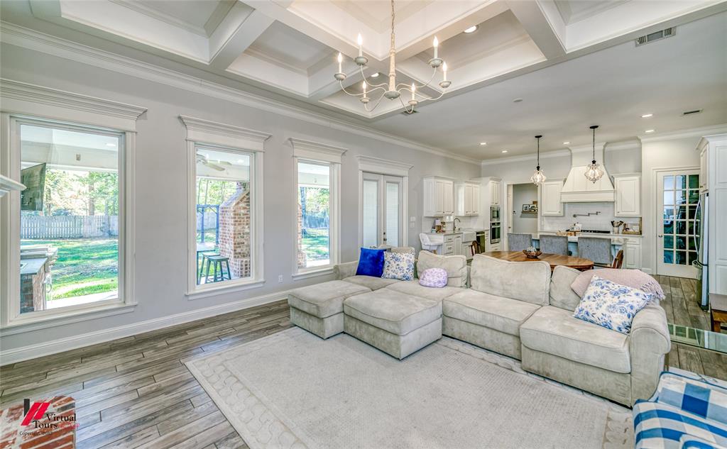 327 Ramsey Road Stonewall, LA 71078 - Photo 9 of 40 a living room with furniture and a large window