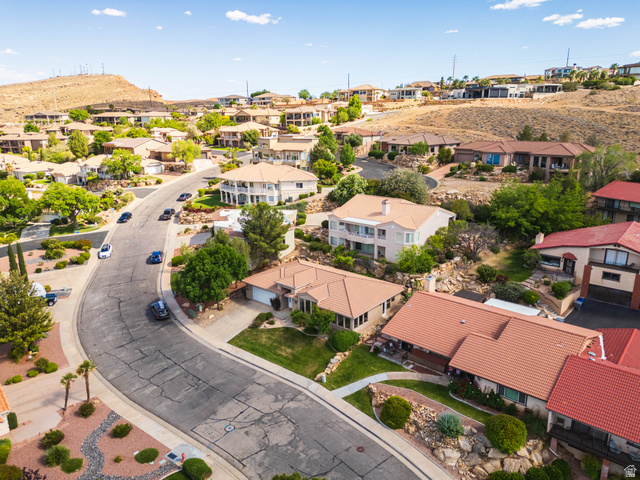 2158 Balboa Way St. George, UT 84770 - Photo 38 of 40 Residential area featuring a paved street and varied architectural styles