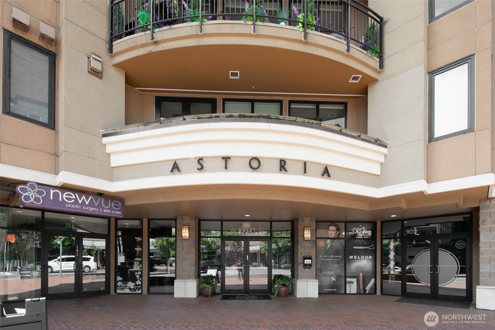 a front view of building with retail shop