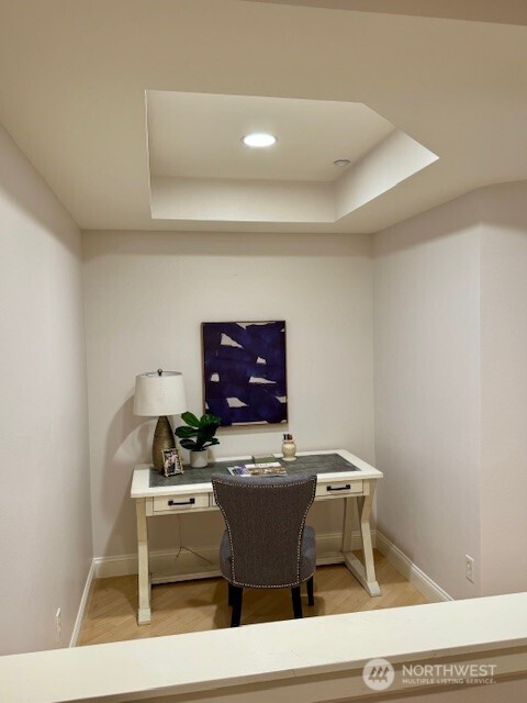 10047 Main Street, Unit 319 Bellevue, WA 98004 - Photo 25 of 30 a room with furniture and window