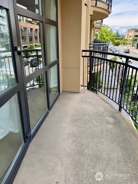 10047 Main Street, Unit 319 Bellevue, WA 98004 - Photo 27 of 30 a view of a balcony