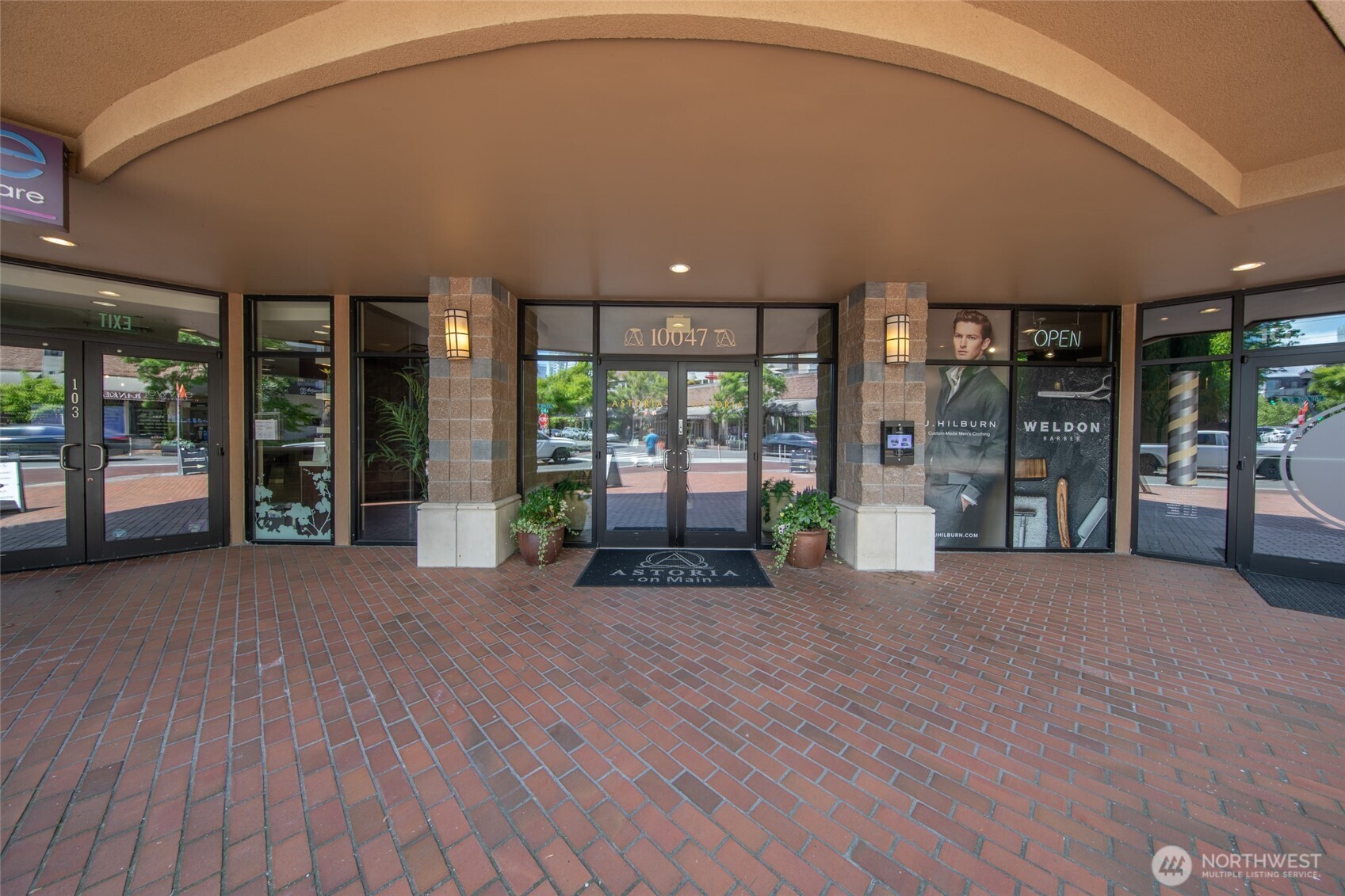 10047 Main Street, Unit 319 Bellevue, WA 98004 - Photo 30 of 30 a view of an entryway with wooden floor