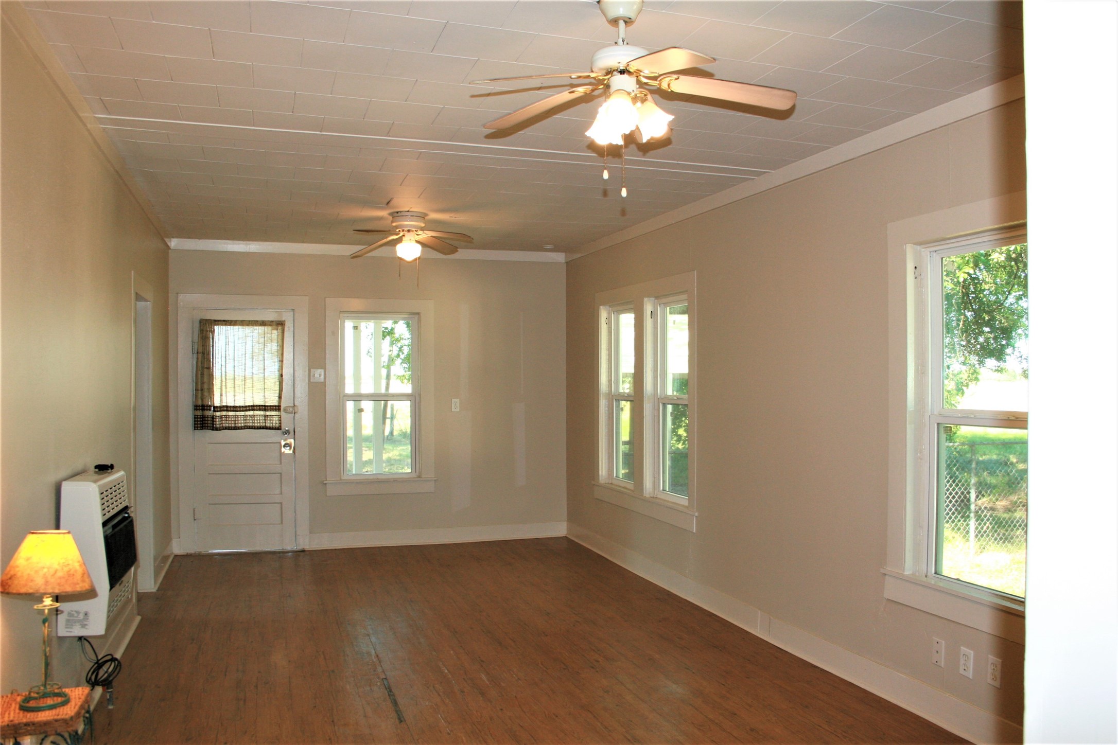 4419 Brast At Fm 3538 Road Sealy, TX 77474 - Photo 5 of 14 a view of a livingroom with a window and a ceiling fan
