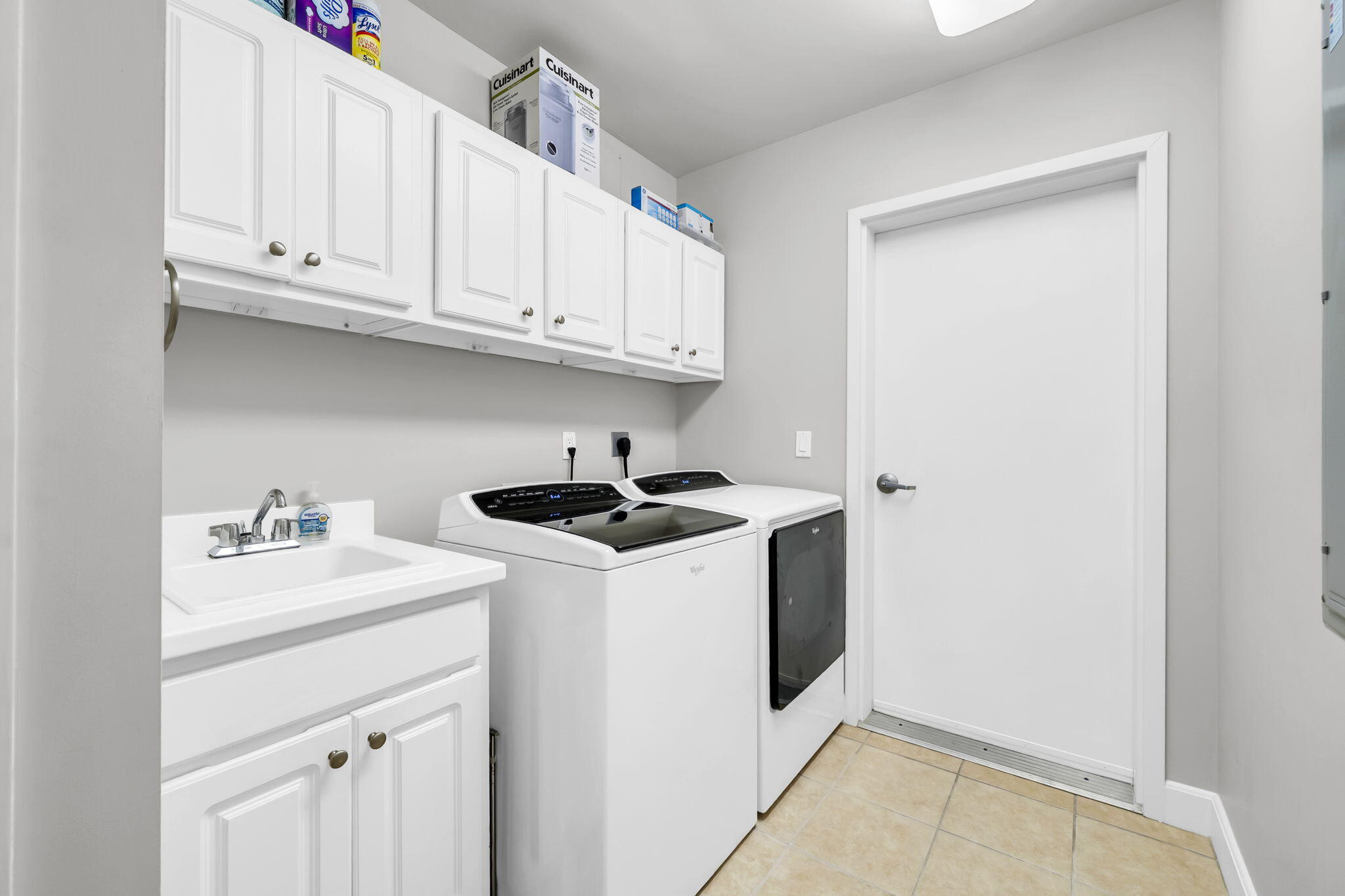 5360 Pine Ridge Lane, Unit 5360 Miramar Beach, FL 32550 - Photo 31 of 44 a utility room with sink dryer and washer