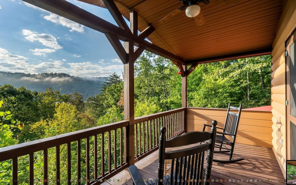 335 Mountain Laurel Lane Blue Ridge, GA 30513 - Photo 19 of 67 a view of a two chair in the balcony