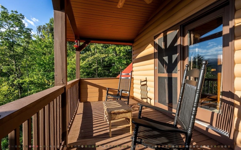 335 Mountain Laurel Lane Blue Ridge, GA 30513 - Photo 21 of 67 a view of balcony with wooden floor and outdoor seating